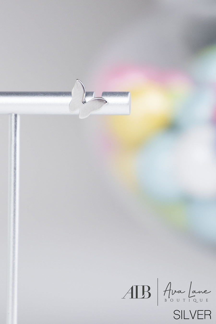 B.b Lila Flutter Stud Earrings