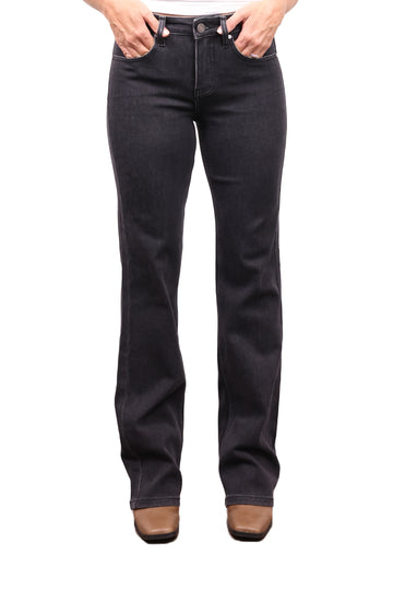 The Erica mid-rise bootcut tummy control jeans in charcoal, front view with boots