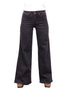 The Kim wide leg jeans in charcoal with boots, front leg detail
