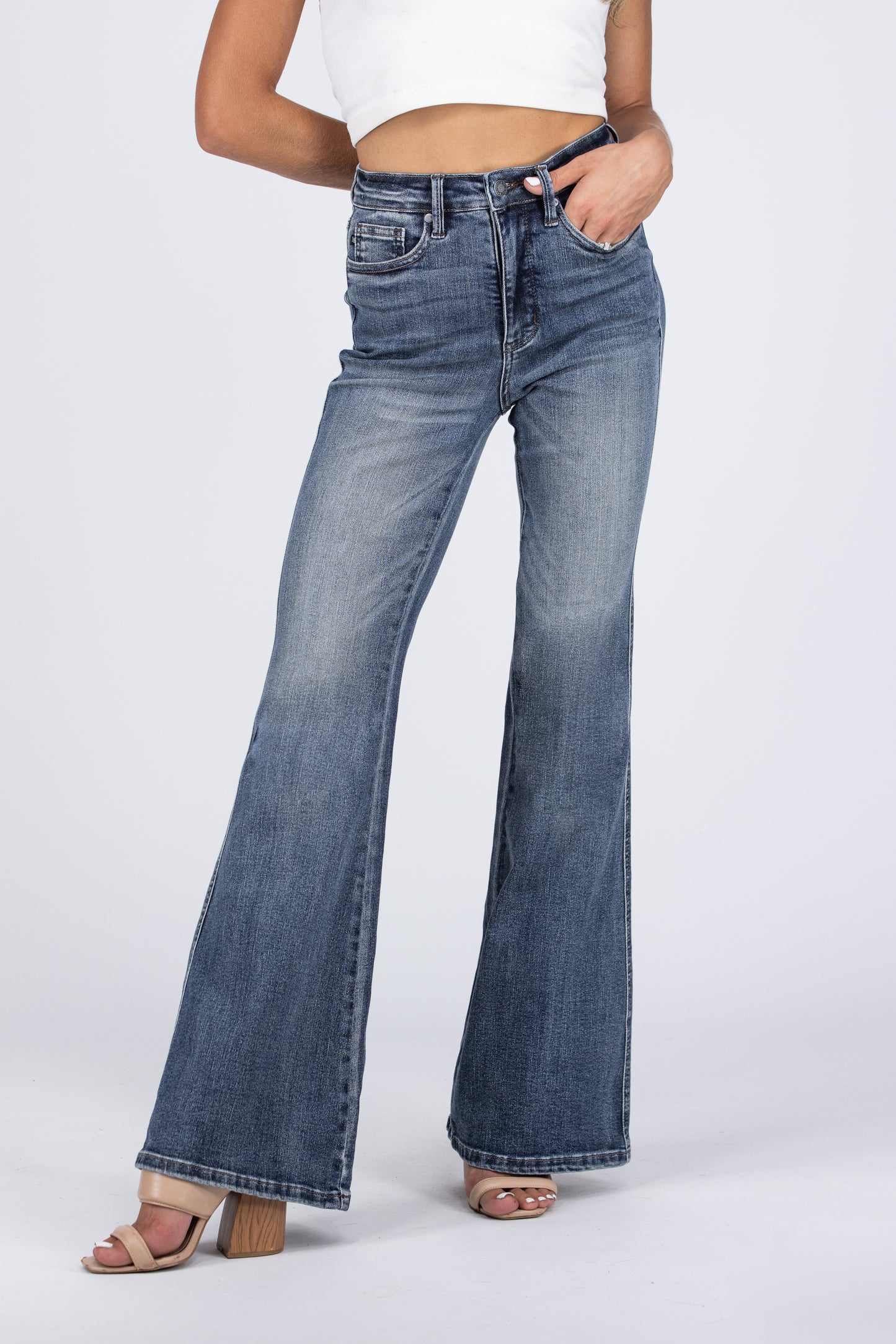 The Daisy from Judy Blue: High-Rise Tummy Control Contrast Wash Flare Denim