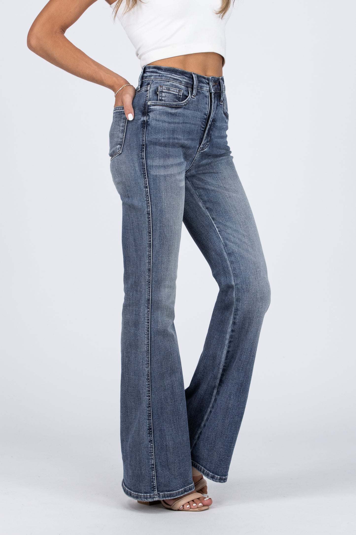 The Daisy from Judy Blue: High-Rise Tummy Control Contrast Wash Flare Denim