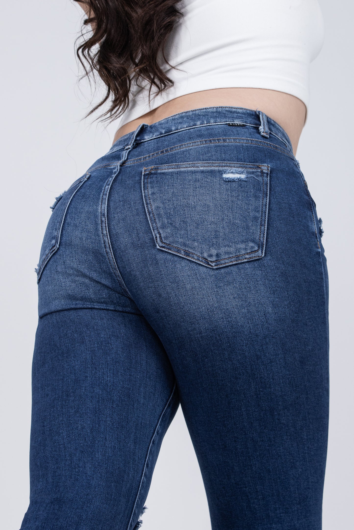 Feel The Music from Risen: High-Rise Tummy Control Flare Denim