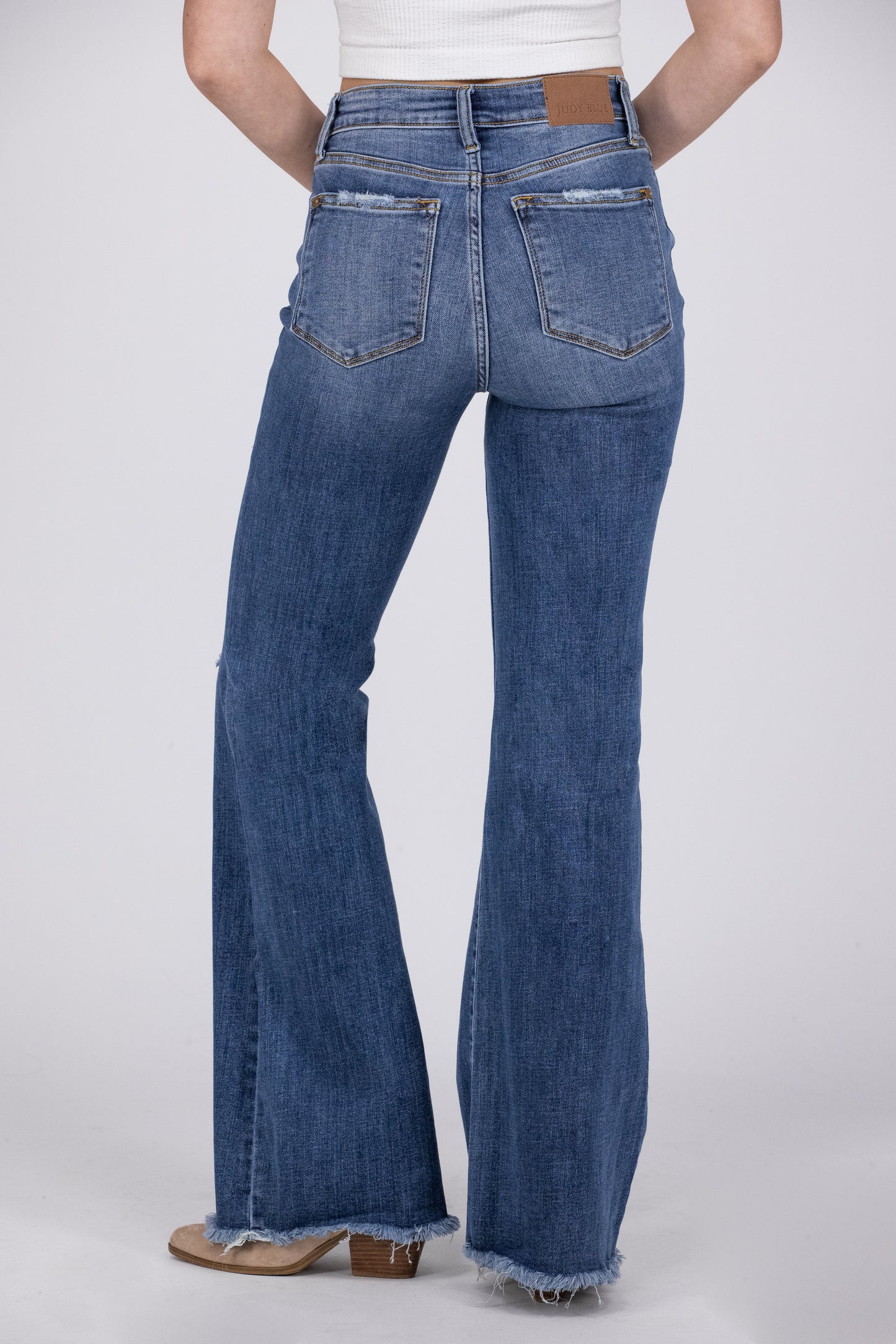 Raise A Glass from Judy Blue: Mid-Rise Button Fly Flare Denim