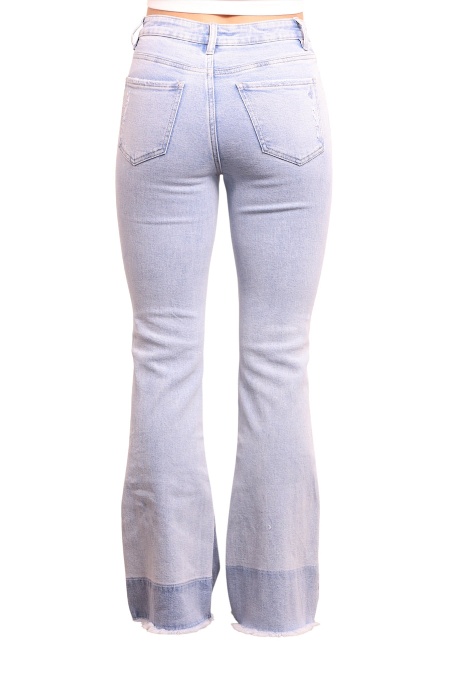 Light blue jeans with a white background