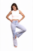 Woman wearing light blue jeans and a white sleeveless top on a white background