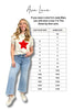 Woman wearing a white t-shirt with a red star and blue jeans, standing next to a size chart for Ava Lane clothing.