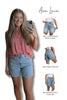 Woman wearing denim shorts with product details on a white background