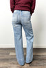 The Kendall from Risen: Mid-Rise Tummy Control Ankle Wide Flare Medium Wash Denim