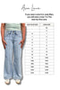 Person wearing light blue jeans with a size chart for Ava Lane clothing on a white background