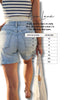Person wearing denim shorts with a size chart overlay on a white background