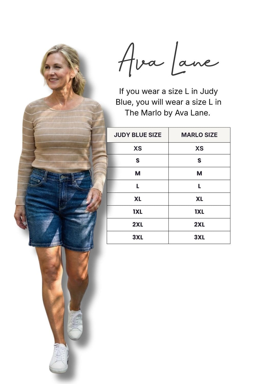 Woman wearing a striped sweater and denim shorts with a size chart for Ava Lane clothing.
