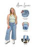 Woman wearing light blue jeans with an inset showing different hem styles and 'Ava Lane' branding.