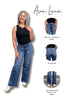 Woman wearing blue jeans with text highlighting features on a white background