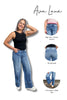 Woman wearing blue jeans with text highlighting features on a white background