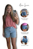 Woman wearing denim shorts with product features highlighted on a white background