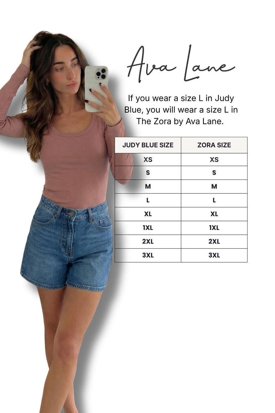Woman taking a selfie wearing a pink top and blue shorts, with a size chart for Ava Lane clothing on a white background.