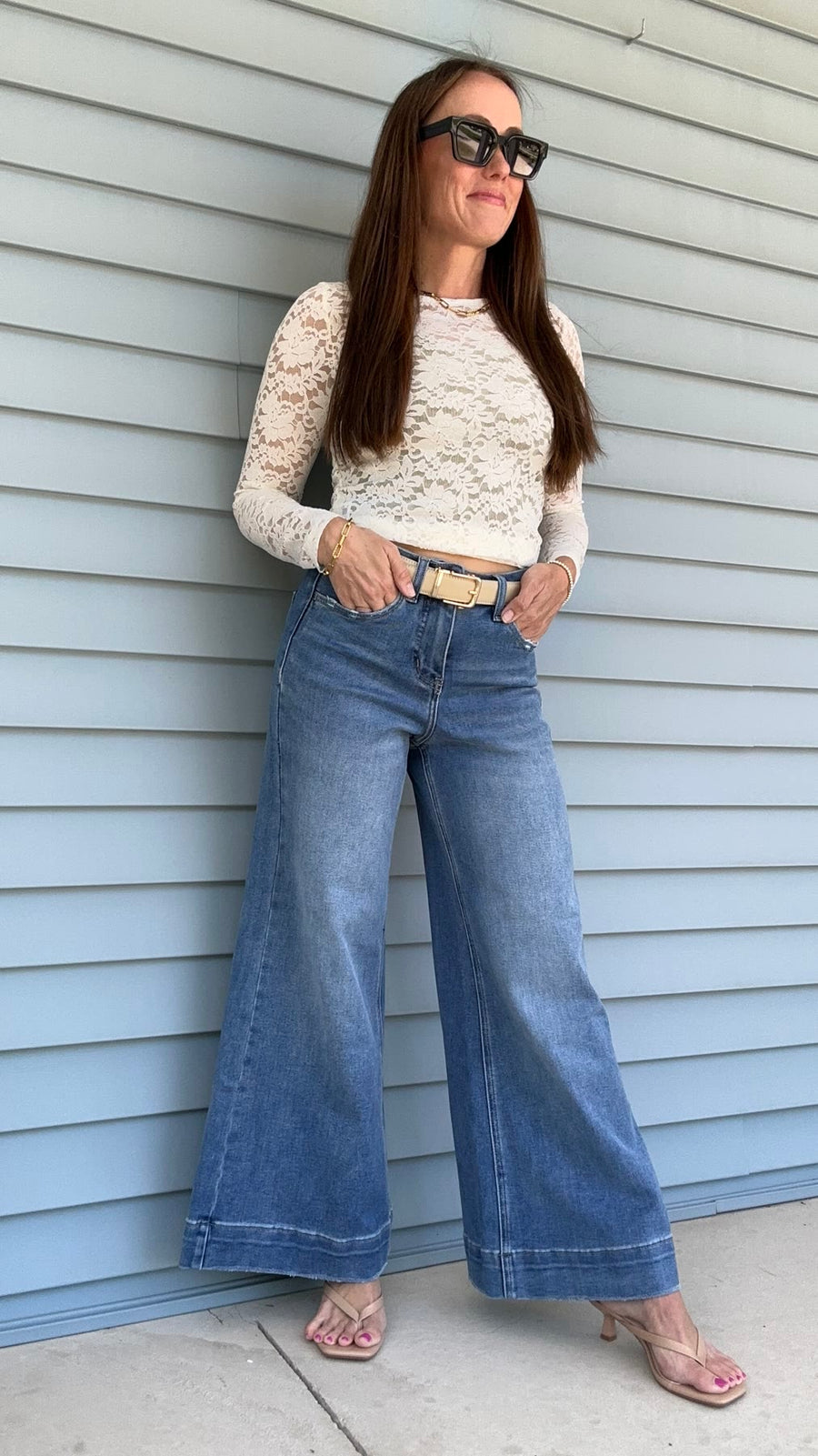 Laura, Ava Lane founder, 5'2" wearing the Billy jeans