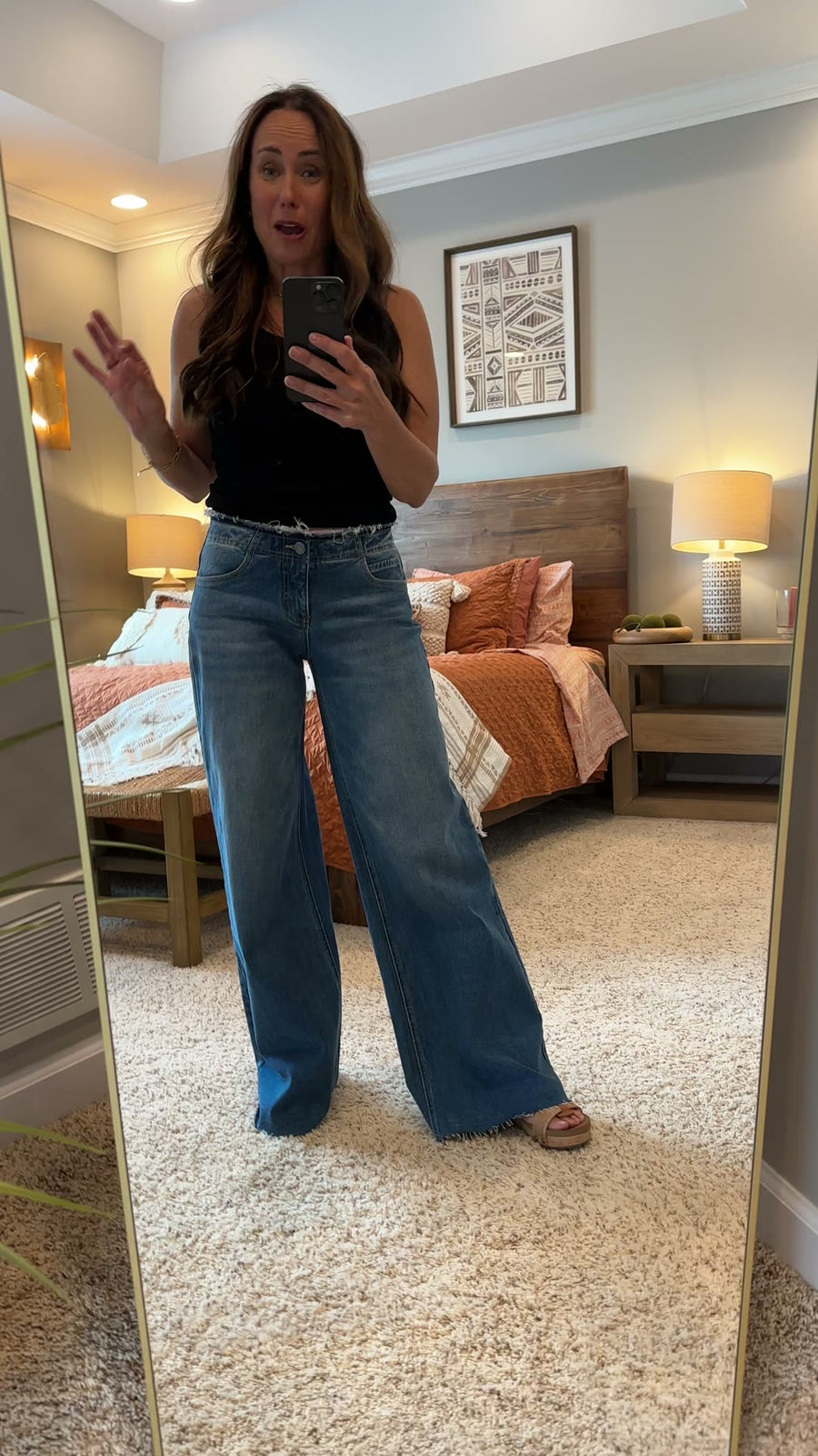 Laura, Ava Lane founder, 5'2" wearing the Drew low rise wide leg jeans in size 1