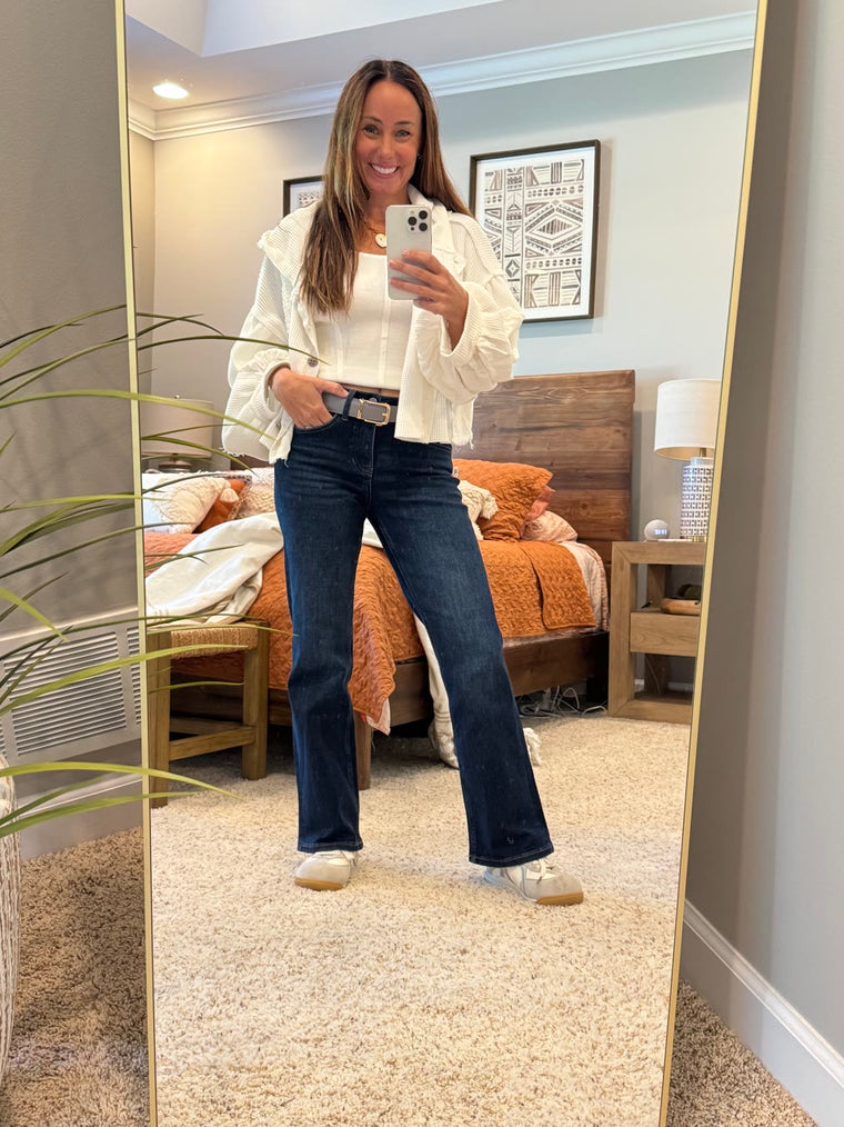 Laura wearing the Erica mid rise bootcut jeans with sneakers, size 1 Short 29"