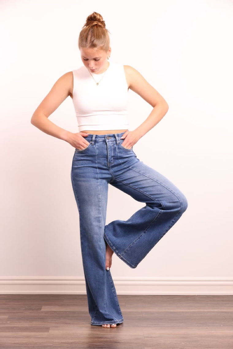 Model in the Esme high rise wide leg jeans, full length
