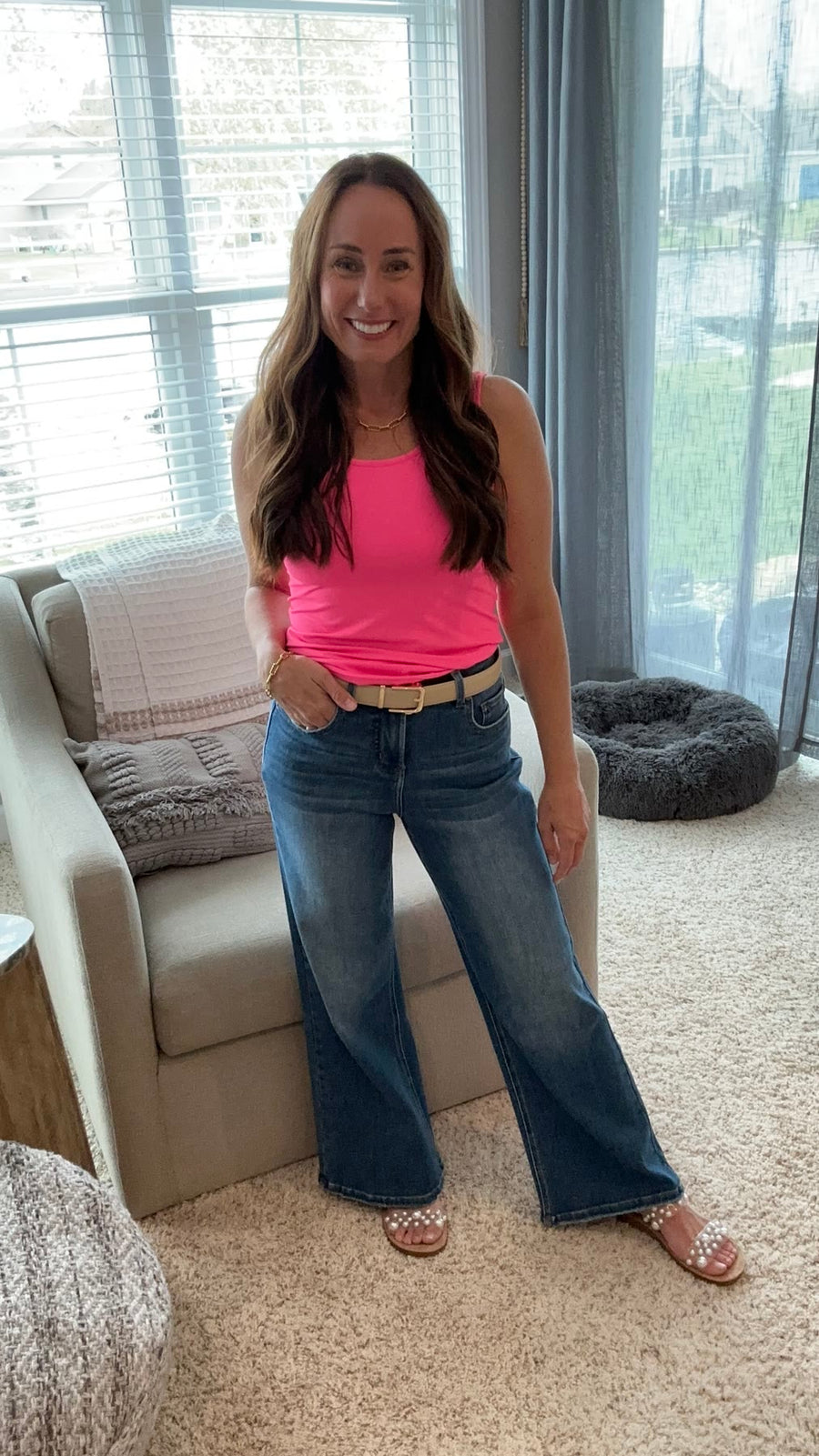 Laura, Ava Lane founder, 5'2" wearing the Shelby jeans