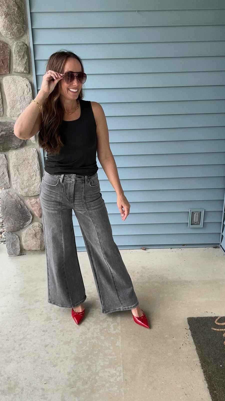 Laura, Ava Lane founder, 5'2" wearing the Storm jeans